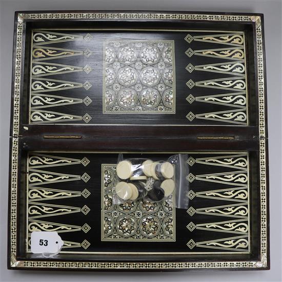 An Indian mother of pearl and bone chess/backgammon games box with horn and bone counters width 42cm depth 21cm